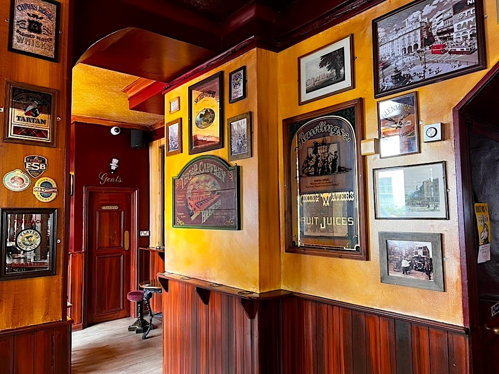 Prince of Wales Pimlico SW1 traditional pub interior, classic wooden a bar and pictures